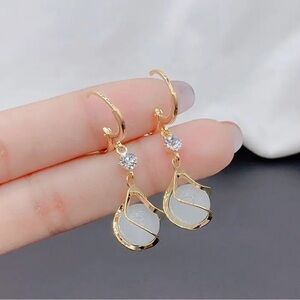 Elegant Gold and White Drop Earrings.